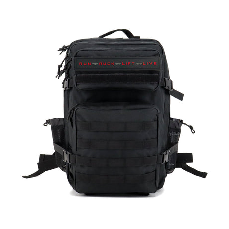 Black Directional Force Motivator Ruck Pack with red text, front view showing multiple compartments and padded straps