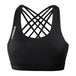 Black women's sports bra with criss-cross strappy back and medium scoop neckline, front view