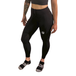Woman wearing black full-length compression leggings with MudGear logo and black compression socks